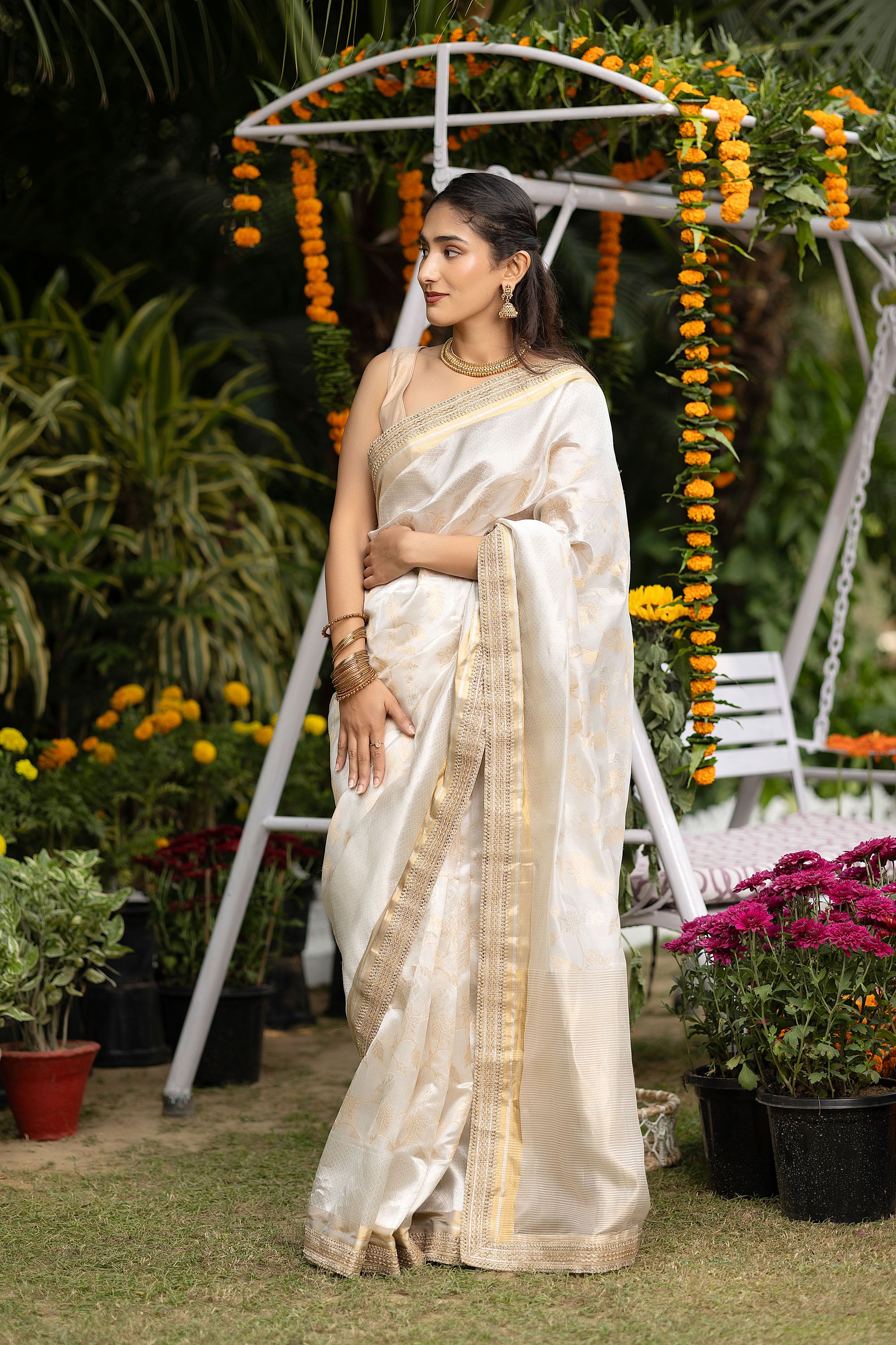 Chanderi handwoven pure silk white saree with all-over golden and silver zari weaved design