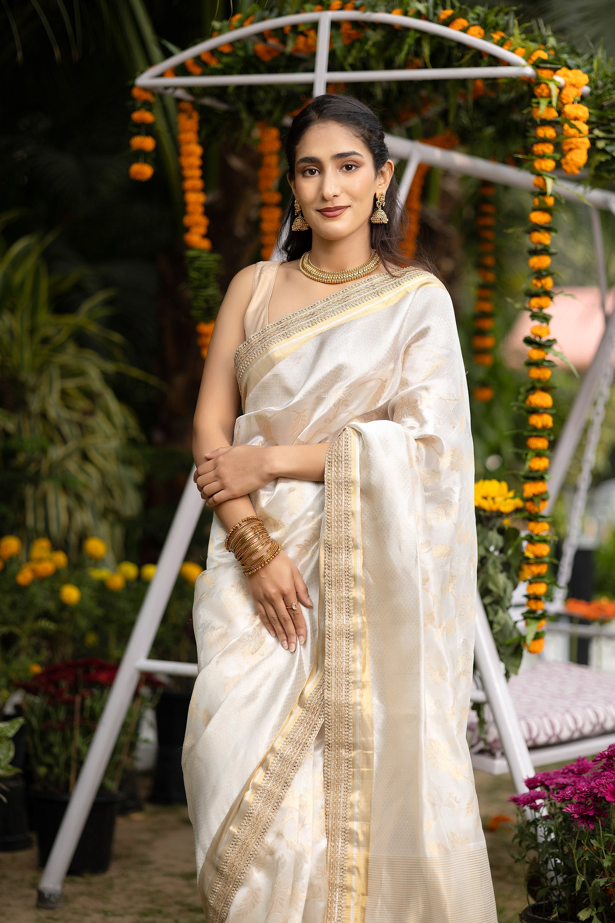 Chanderi handwoven pure silk white saree with all-over golden and silver zari weaved design