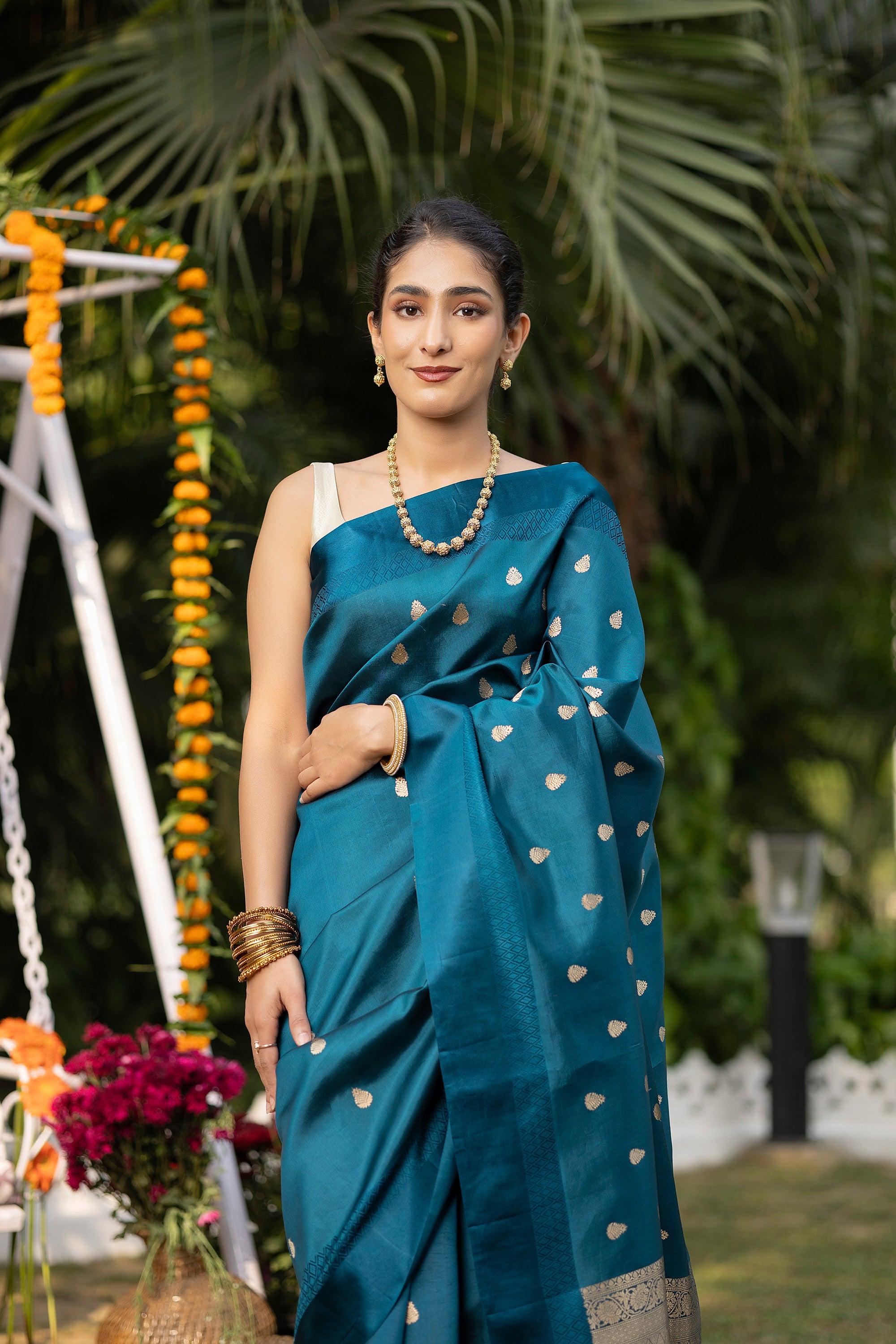 Banarasi handloom teal blue pure silk saree with small zari Buti and zari pallu