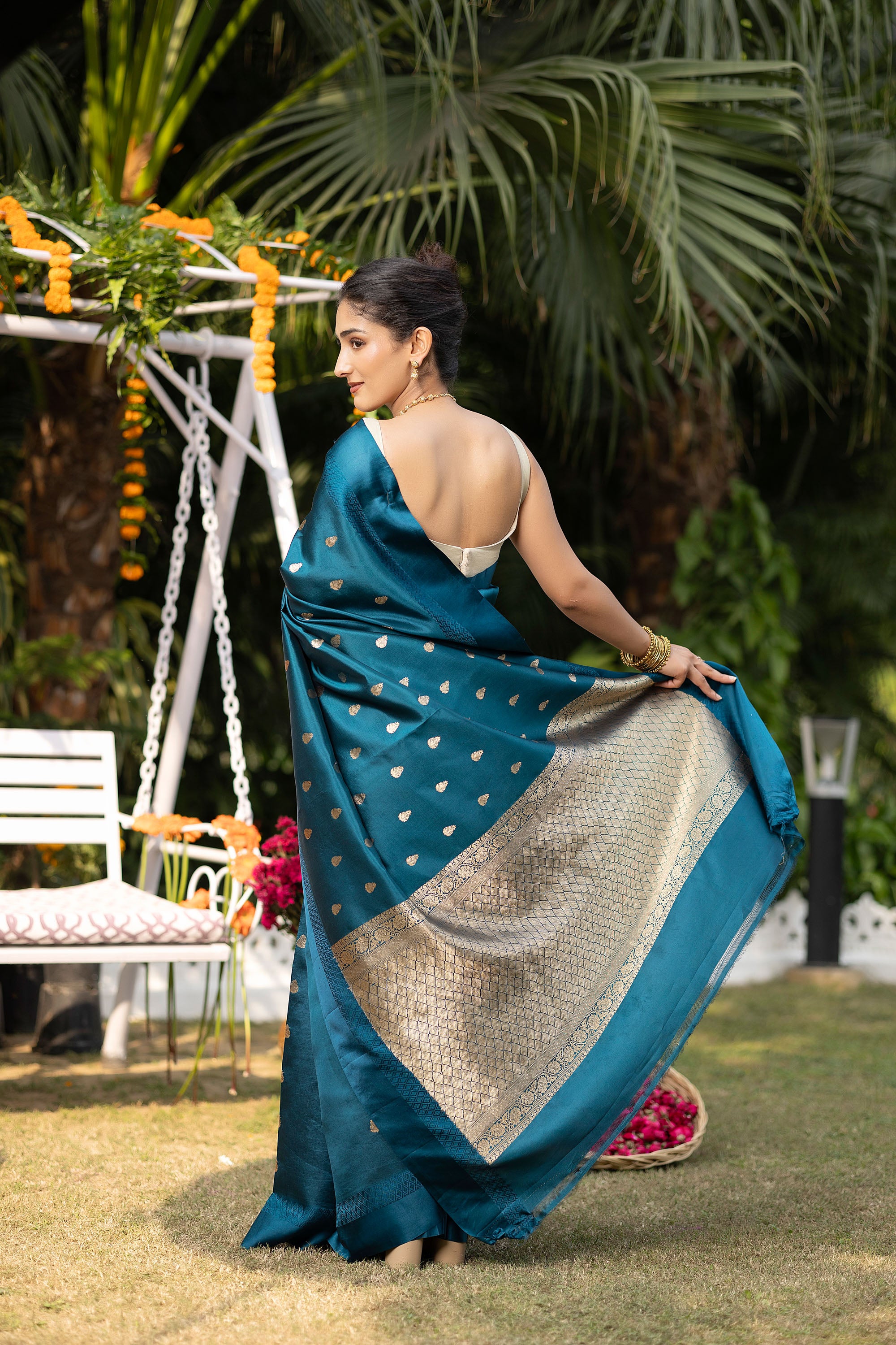 Banarasi handloom teal blue pure silk saree with small zari Buti and zari pallu