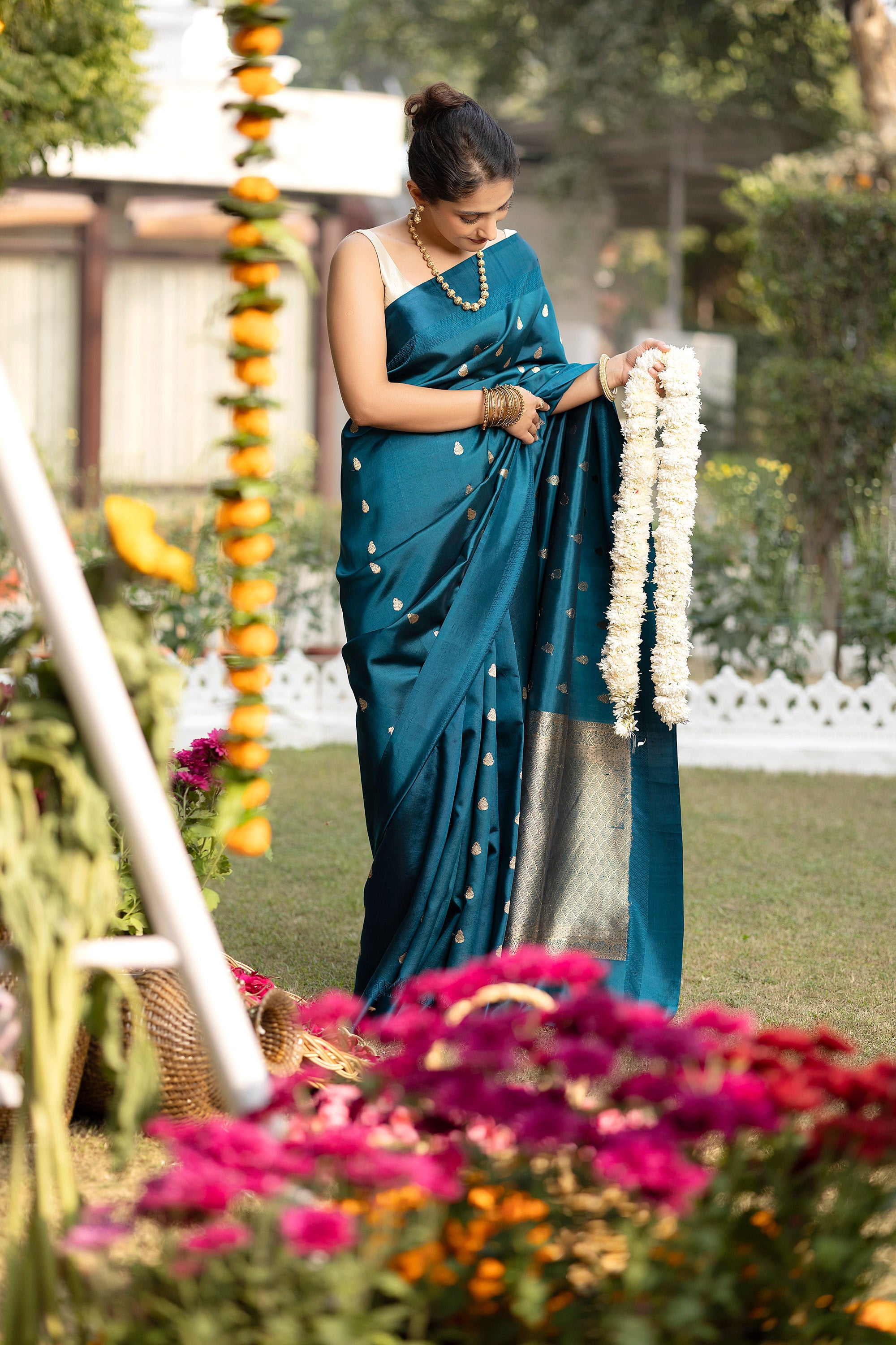Banarasi handloom teal blue pure silk saree with small zari Buti and zari pallu
