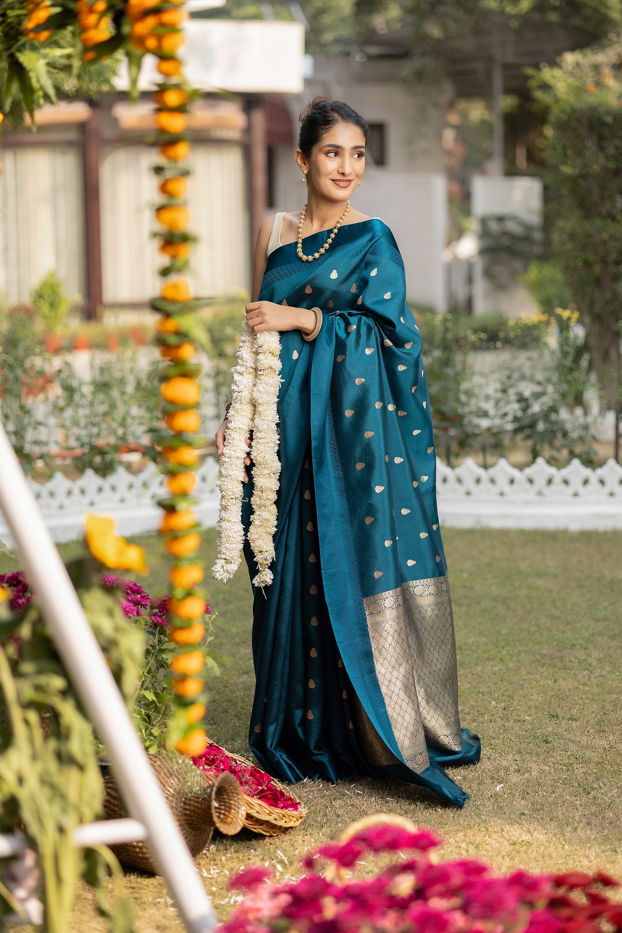 Banarasi handloom teal blue pure silk saree with small zari Buti and zari pallu