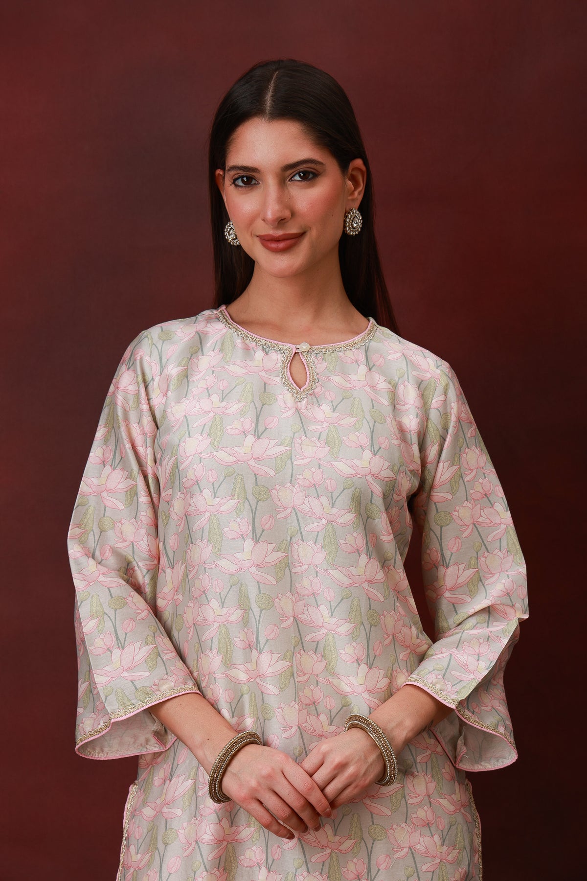 Model wearing the Kamal Phool blush lotus print Chanderi silk suit with olive dupatta