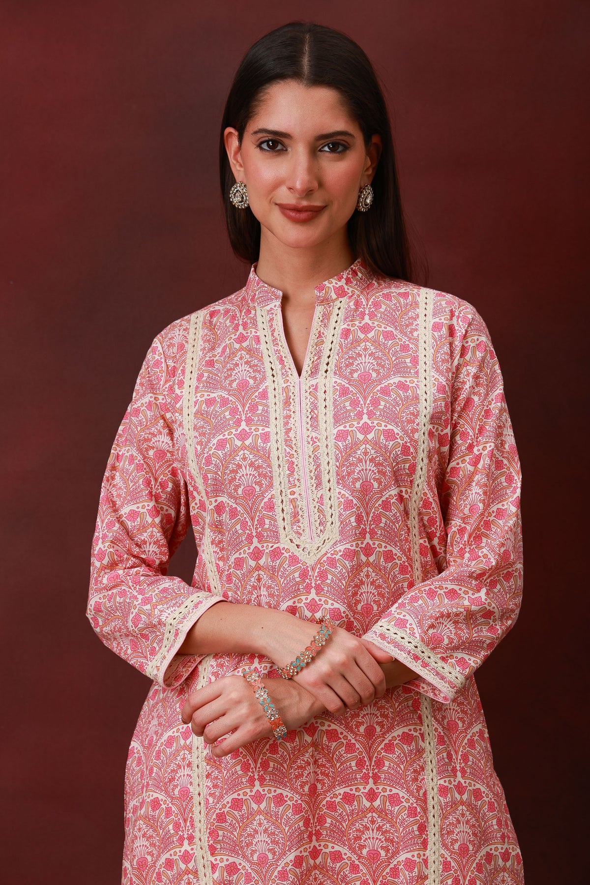 Model wearing the Gulrukh rose pink Jaipuri print cotton three-piece suit with dupatta