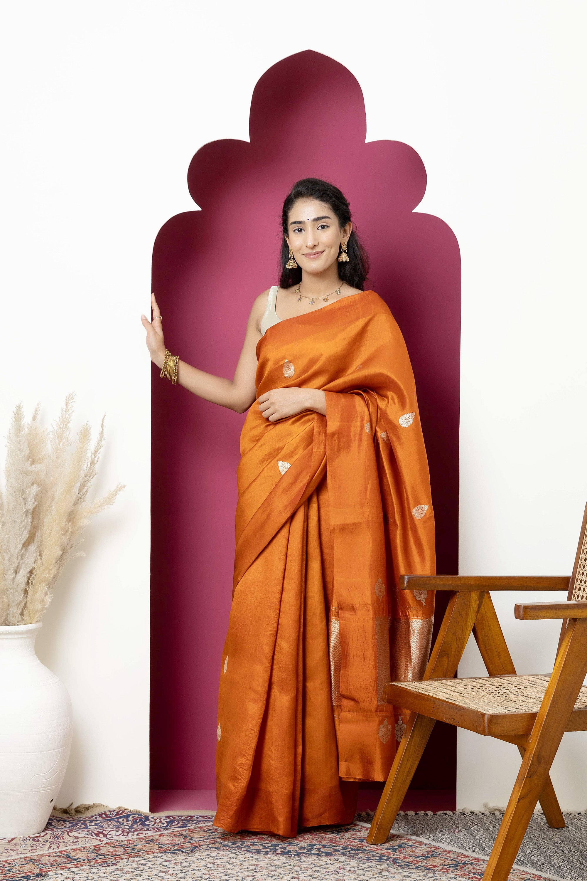 Banarasi Handloom rust yellow pure silk saree with large bute and zari border