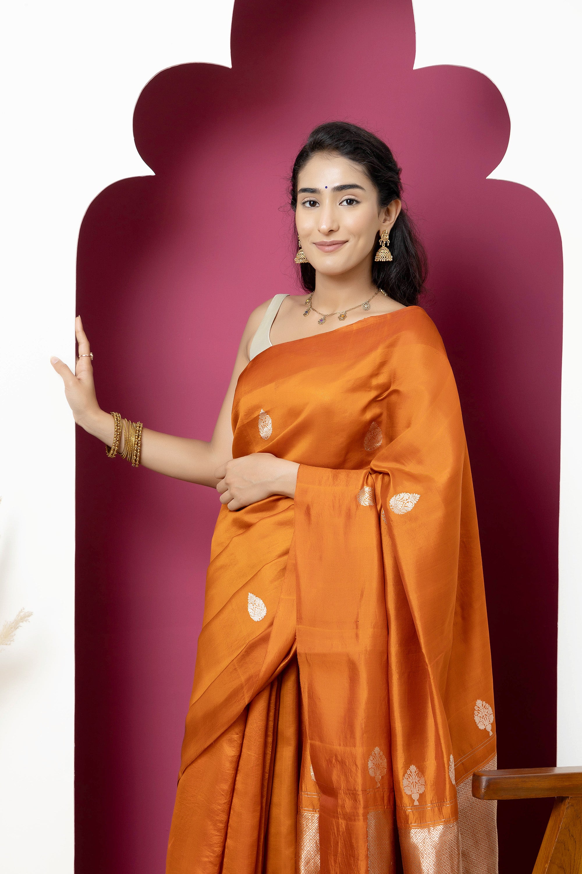 Banarasi Handloom rust yellow pure silk saree with large bute and zari border