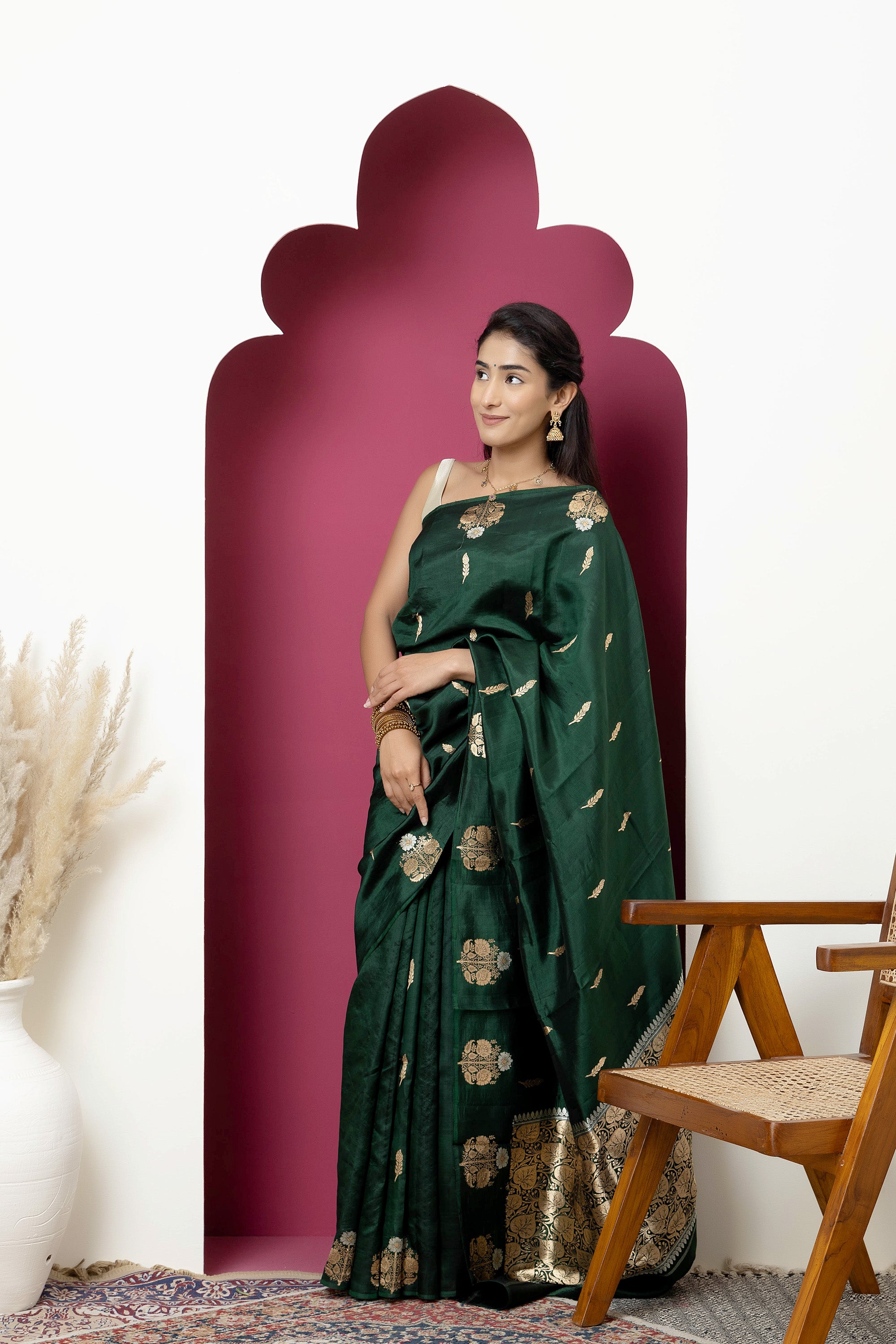 Banarasi Handloom deep bottle green pure silk saree with large bute on the border, bute all over and zari border