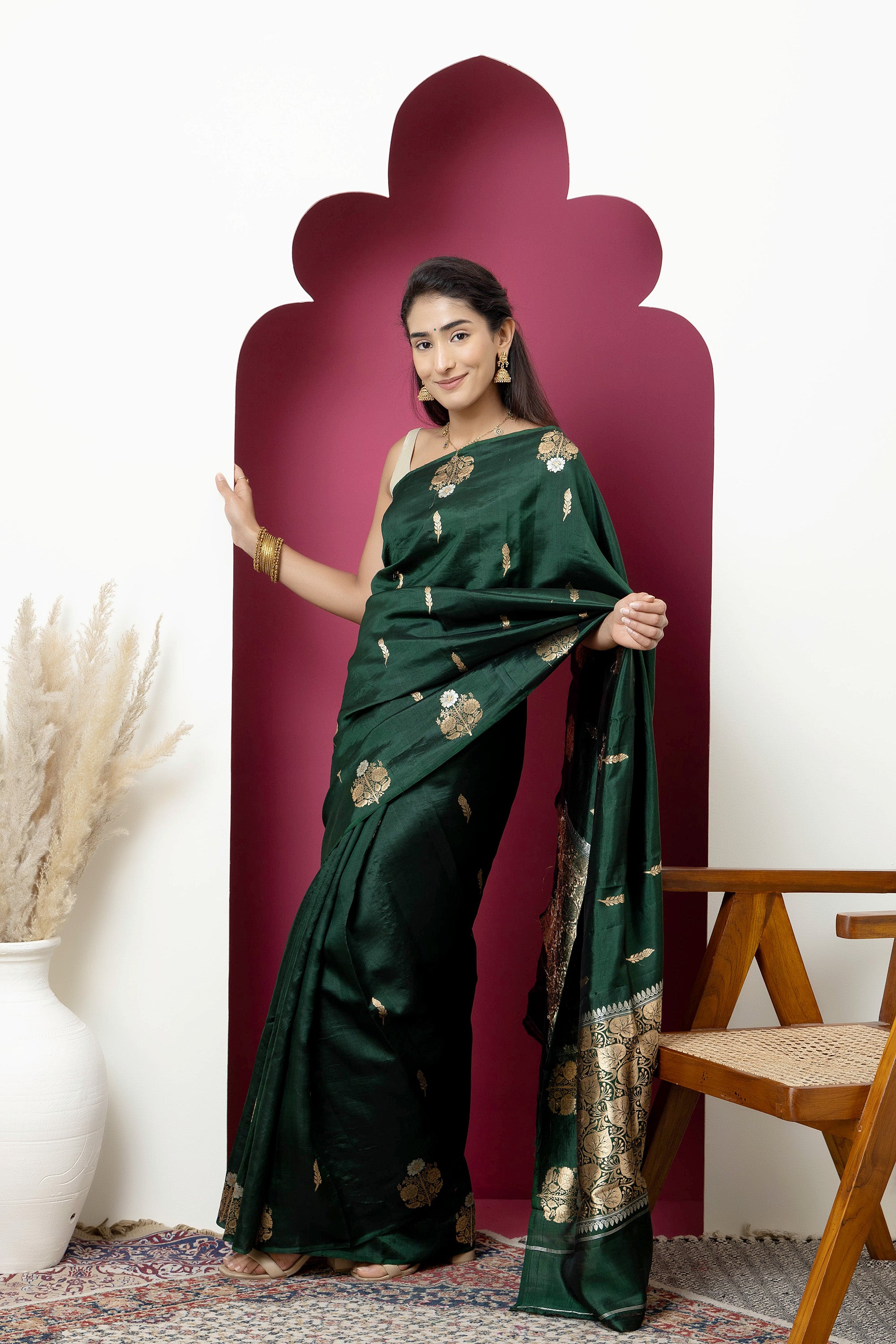 Banarasi Handloom deep bottle green pure silk saree with large bute on the border, bute all over and zari border