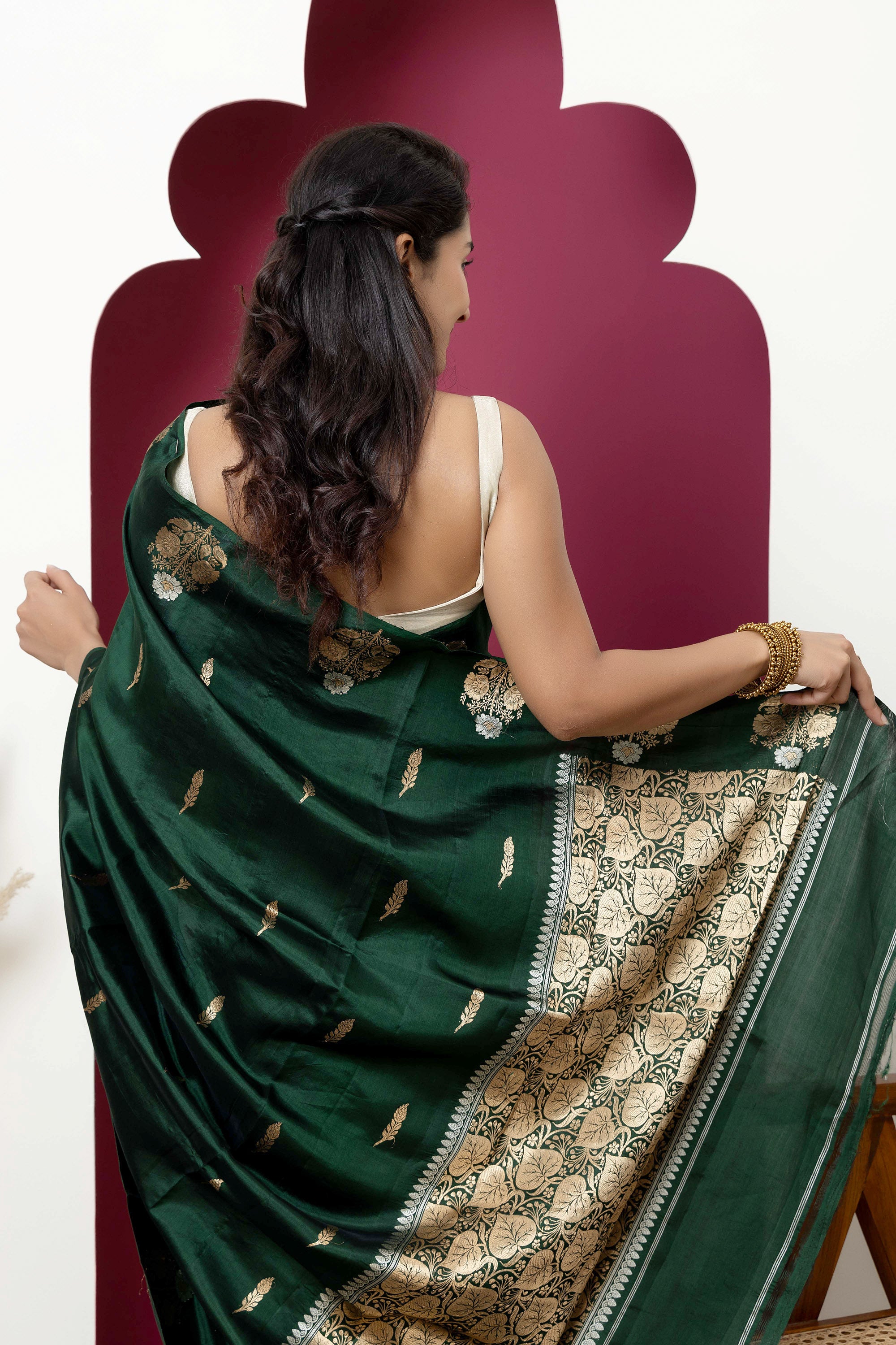 Banarasi Handloom deep bottle green pure silk saree with large bute on the border, bute all over and zari border
