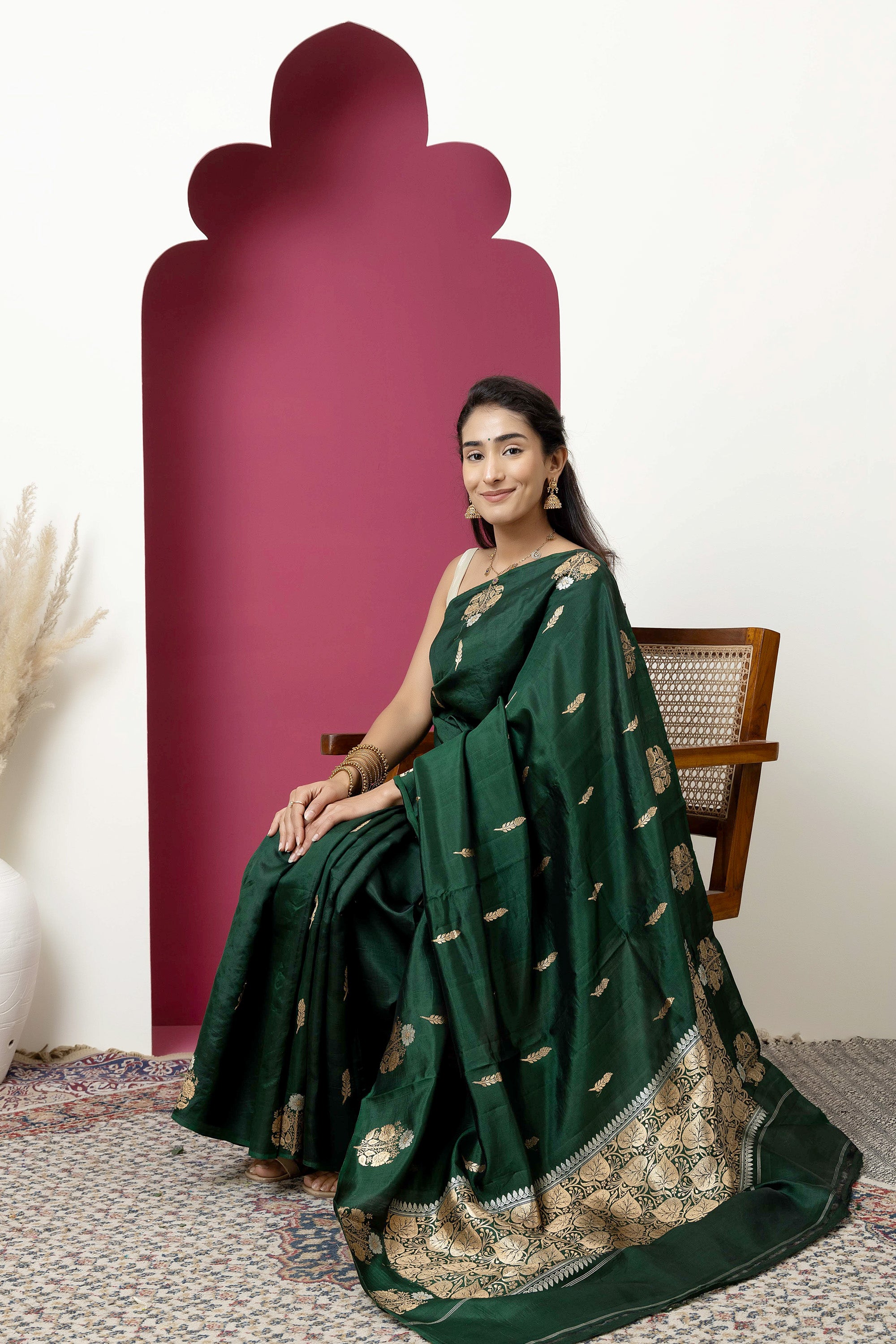 Banarasi Handloom deep bottle green pure silk saree with large bute on the border, bute all over and zari border
