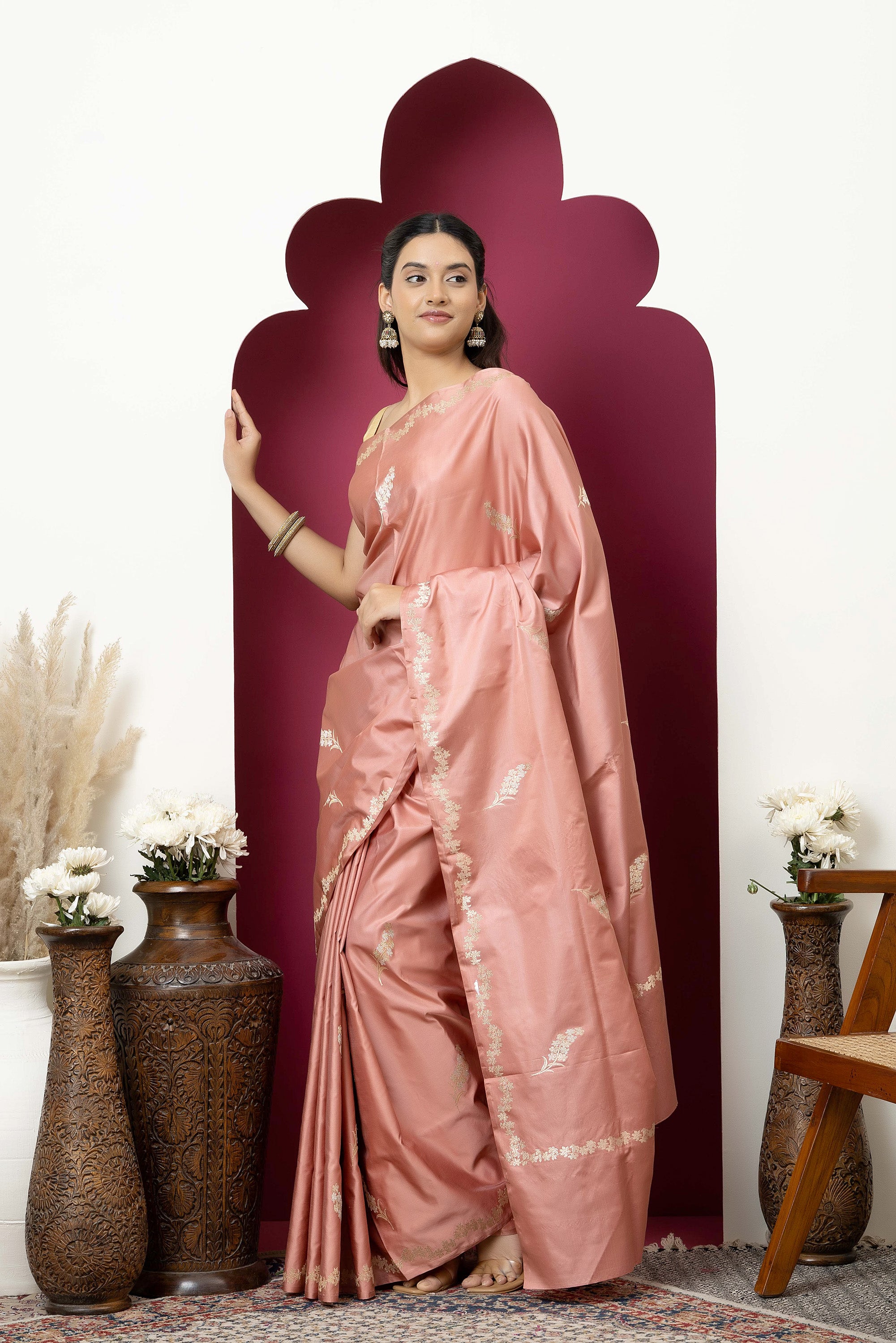 Banarasi Handloom rosewood pink pure Mashru Katan silk  saree with running vine adorned with flowers on the border, small bute all over and zari border