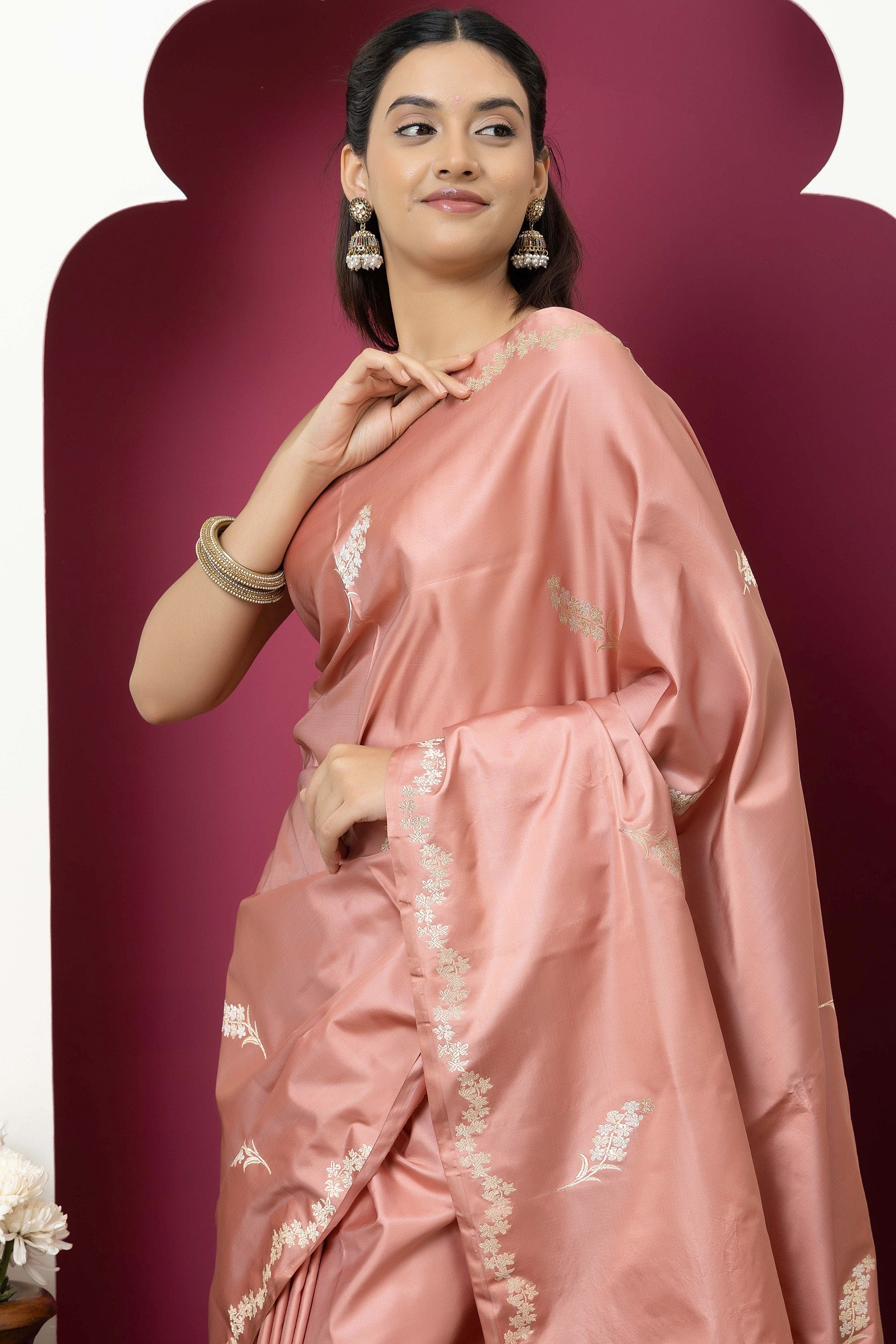 Banarasi Handloom rosewood pink pure Mashru Katan silk  saree with running vine adorned with flowers on the border, small bute all over and zari border