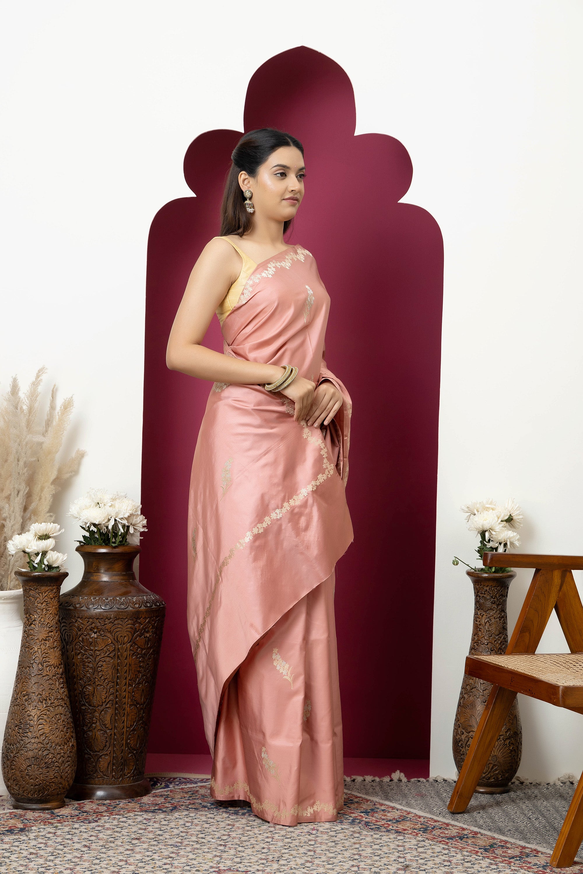 Banarasi Handloom rosewood pink pure Mashru Katan silk  saree with running vine adorned with flowers on the border, small bute all over and zari border
