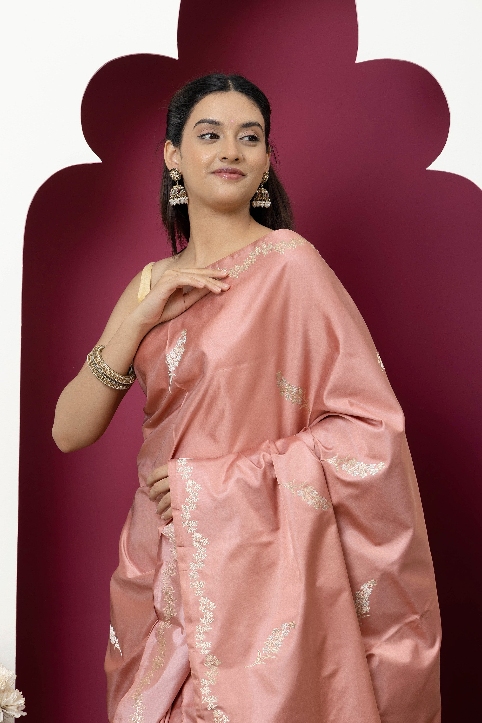 Banarasi Handloom rosewood pink pure Mashru Katan silk  saree with running vine adorned with flowers on the border, small bute all over and zari border
