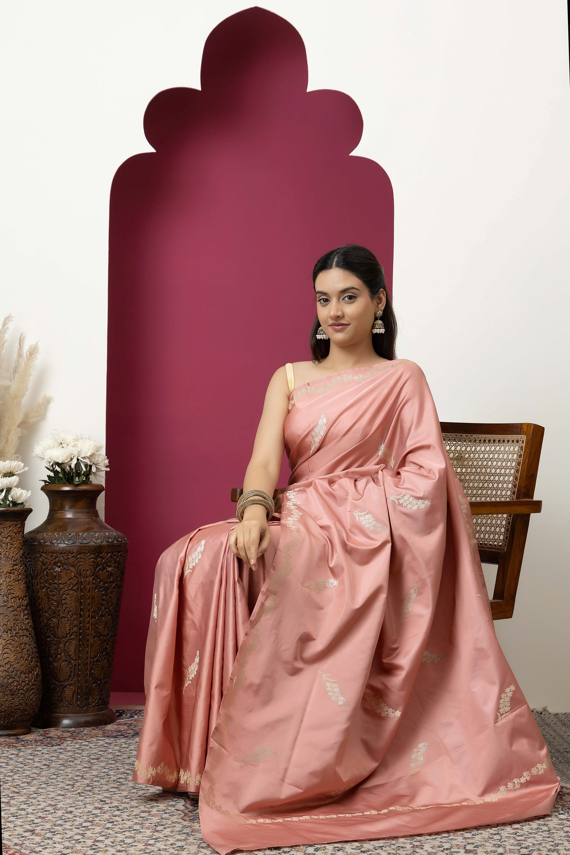 Banarasi Handloom rosewood pink pure Mashru Katan silk  saree with running vine adorned with flowers on the border, small bute all over and zari border