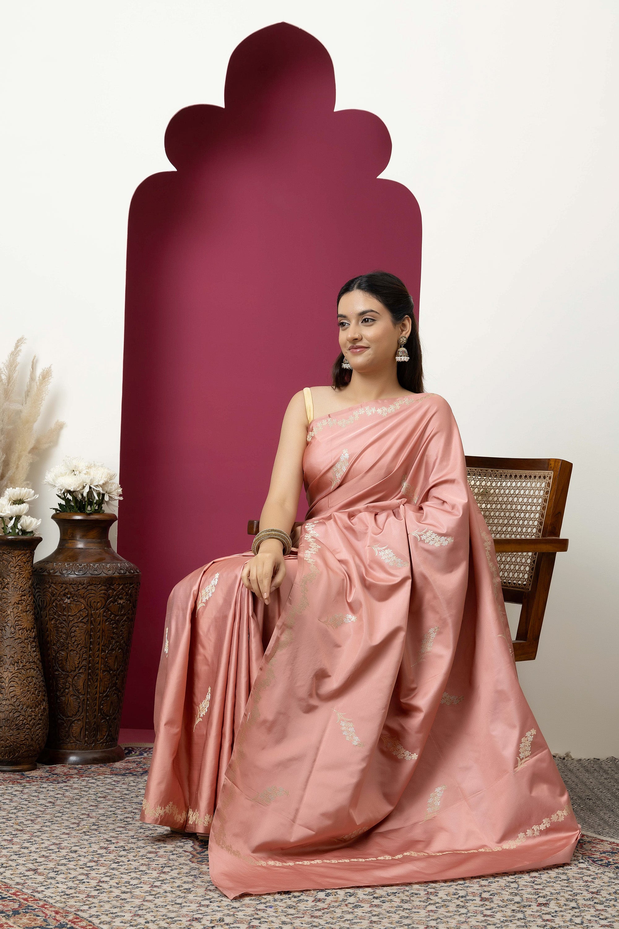 Banarasi Handloom rosewood pink pure Mashru Katan silk  saree with running vine adorned with flowers on the border, small bute all over and zari border