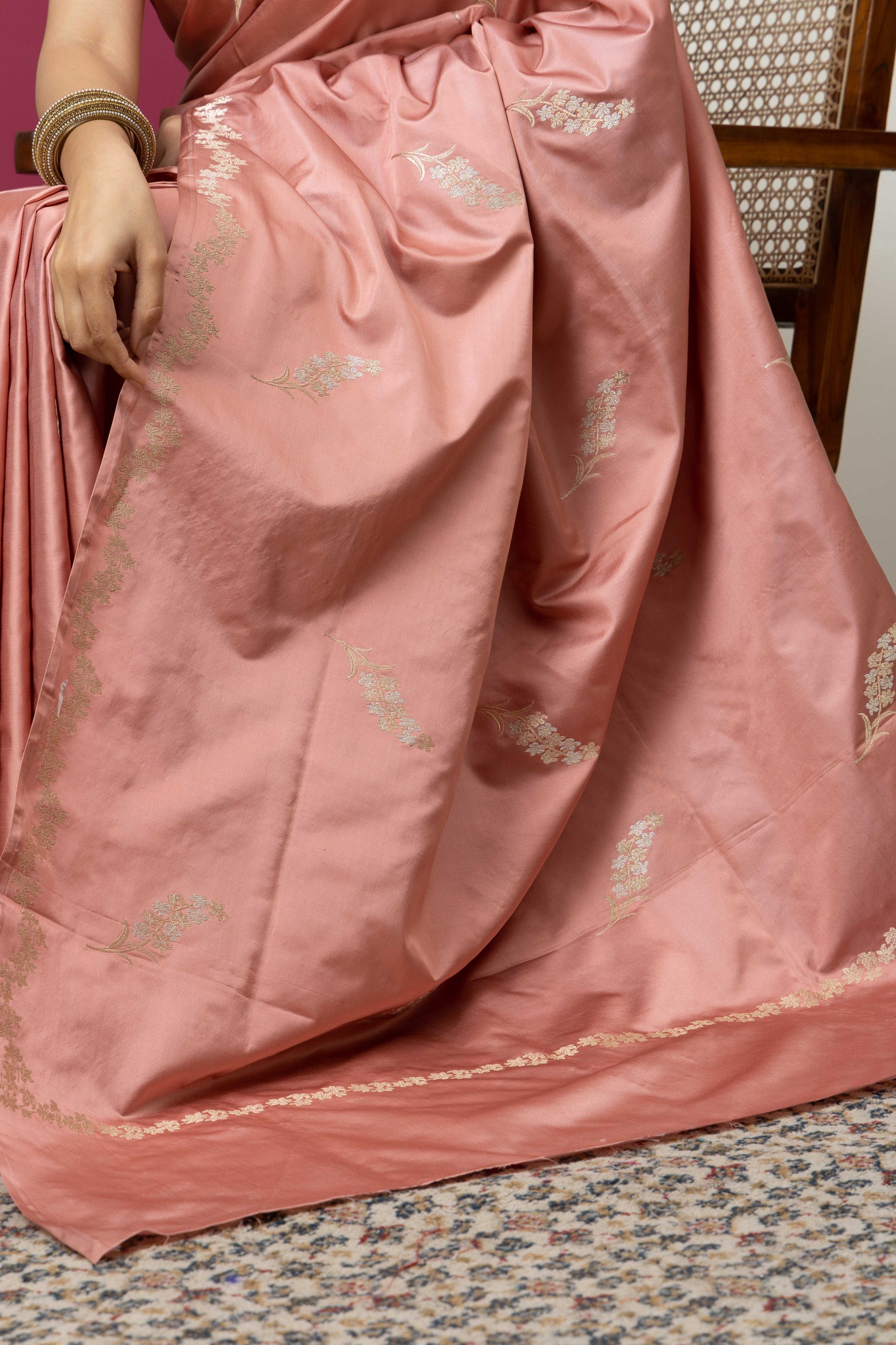 Banarasi Handloom rosewood pink pure Mashru Katan silk  saree with running vine adorned with flowers on the border, small bute all over and zari border