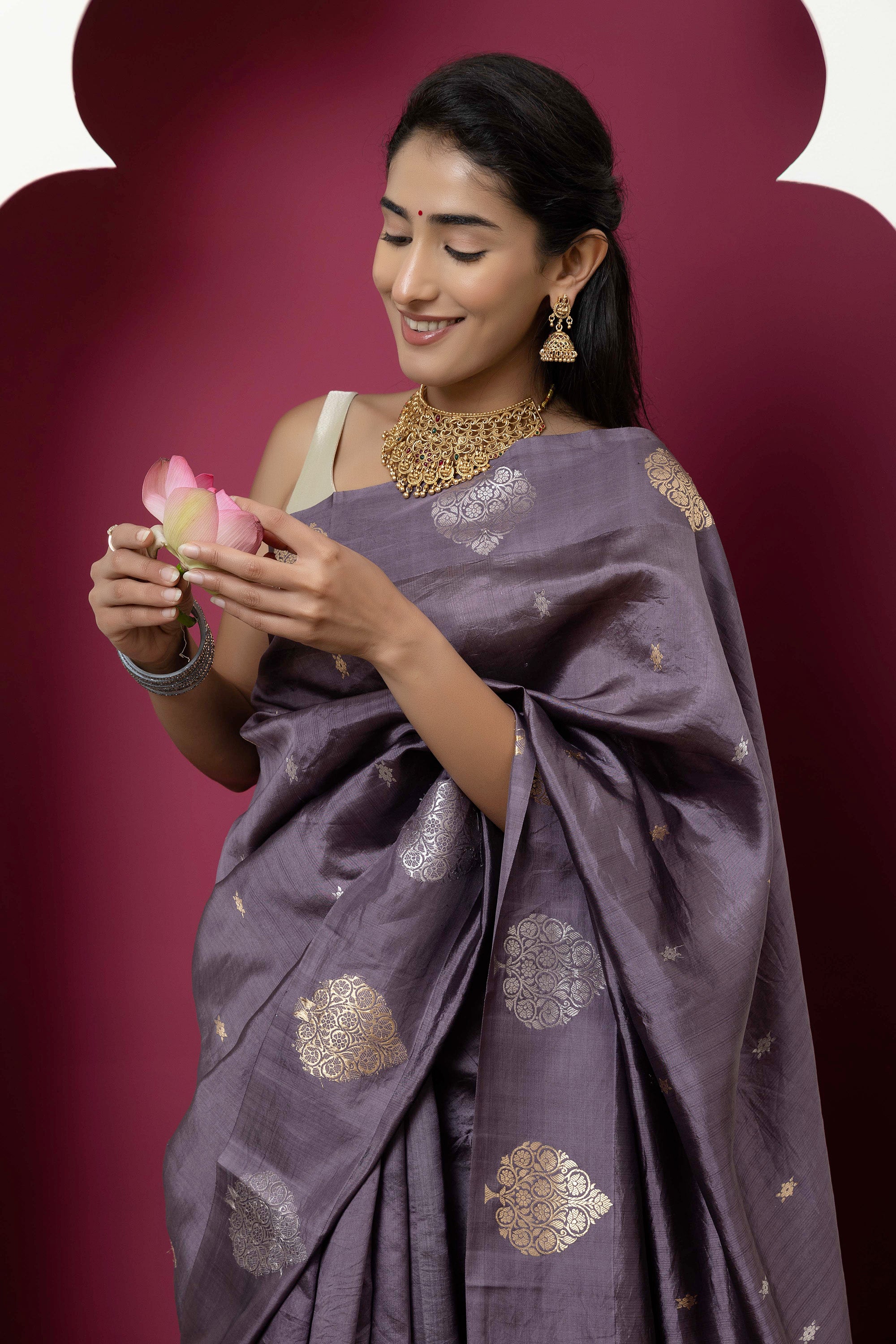 Banarasi Handloom mauve-grey pure silk saree with large buta on the border, small bute all over and zari border