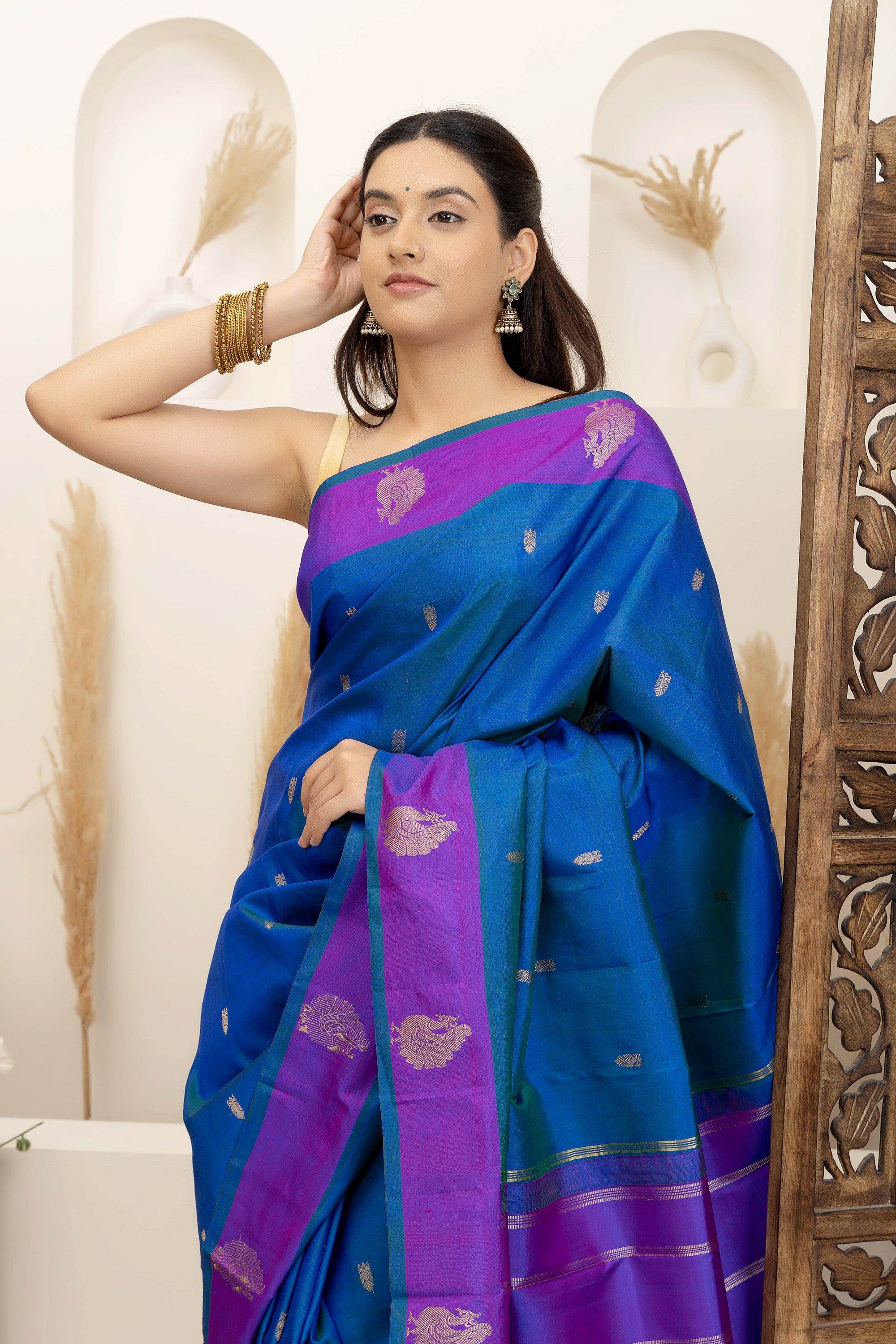 Kanjivaram handloom pure silk pure zari turquoise blue sari with contrast purple border and border and pallu