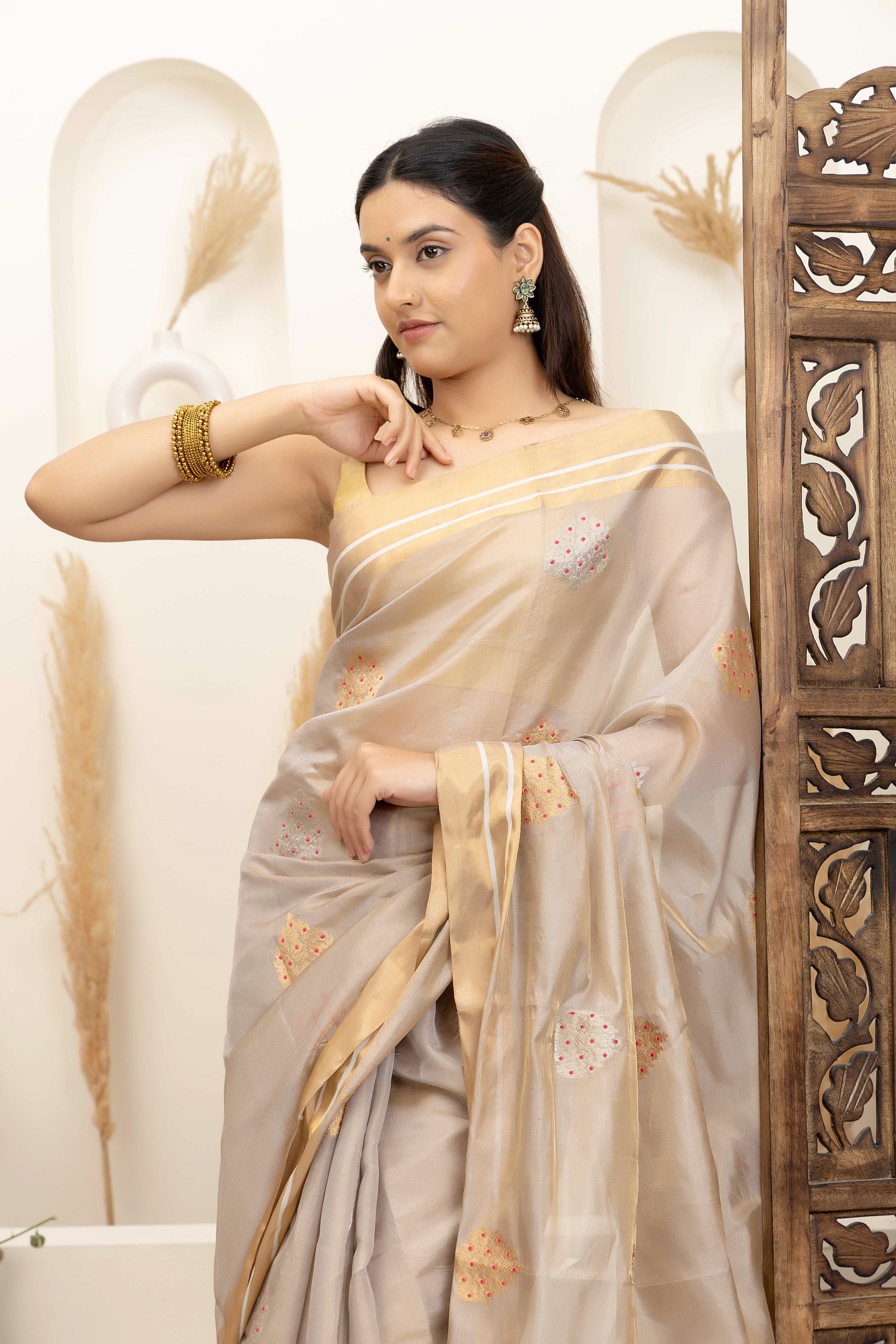 Chanderi handwoven pure silk tissue saree in natural silk beige colour, with large bute all over with meenakari work, zari border and pallu
