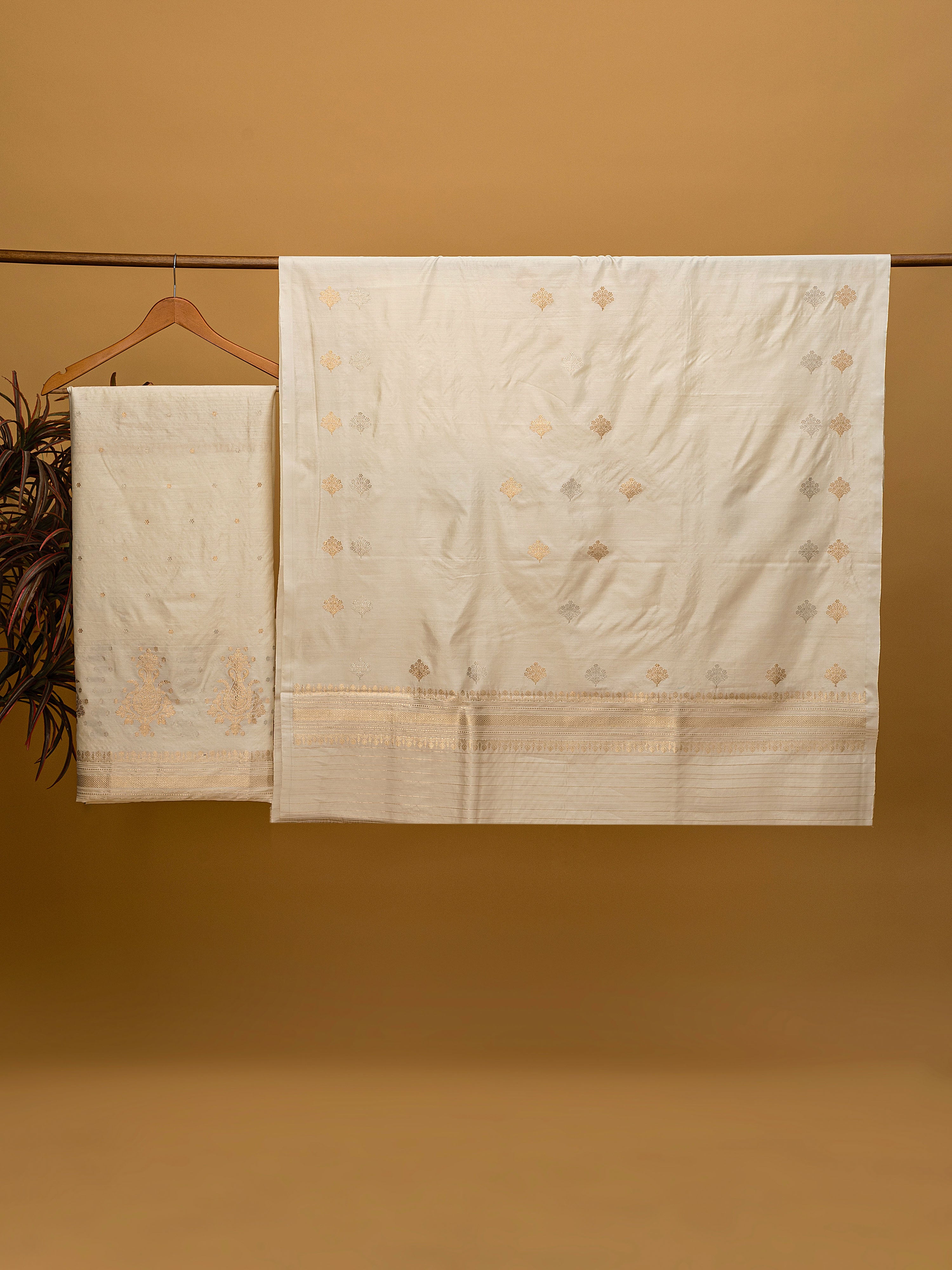 Elegant natural off-white pure silk Banarasi unstitched suit with gold zari weaving
