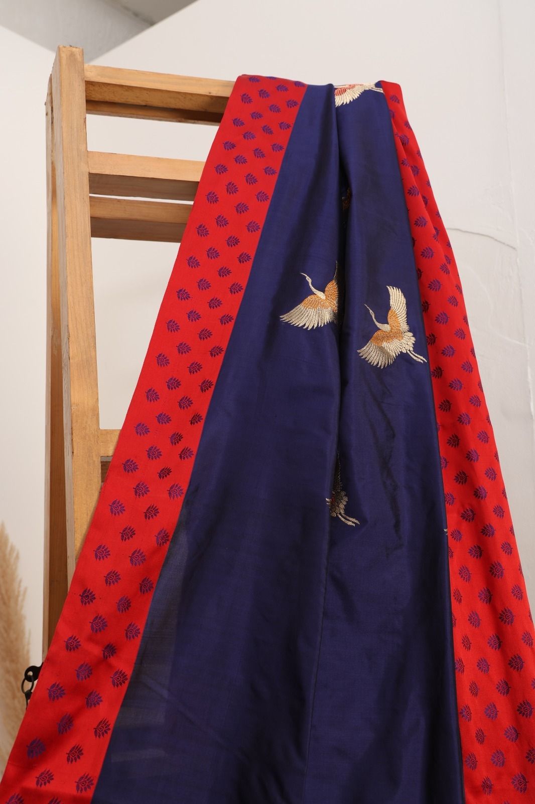 Banarasi pure silk ink blue handloom saree with zari Bute all over and a contrast border and pallu